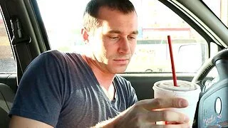 Food amulet video of a dude drinking in his expensive car